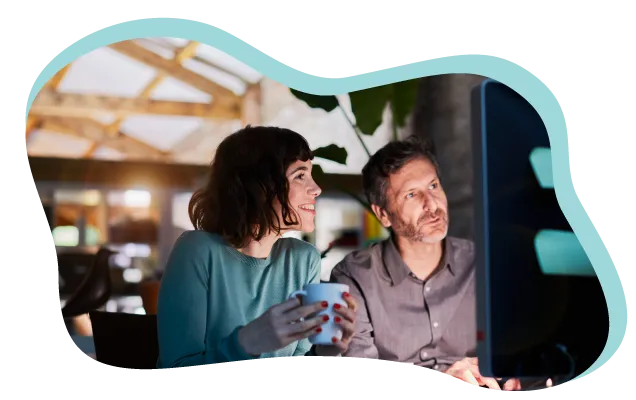 60235b21efae4e34c9e0f884 Ph2 2coworkers At Computer 638x401